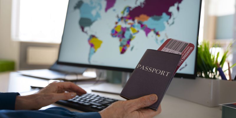 side-view-man-holding-passports